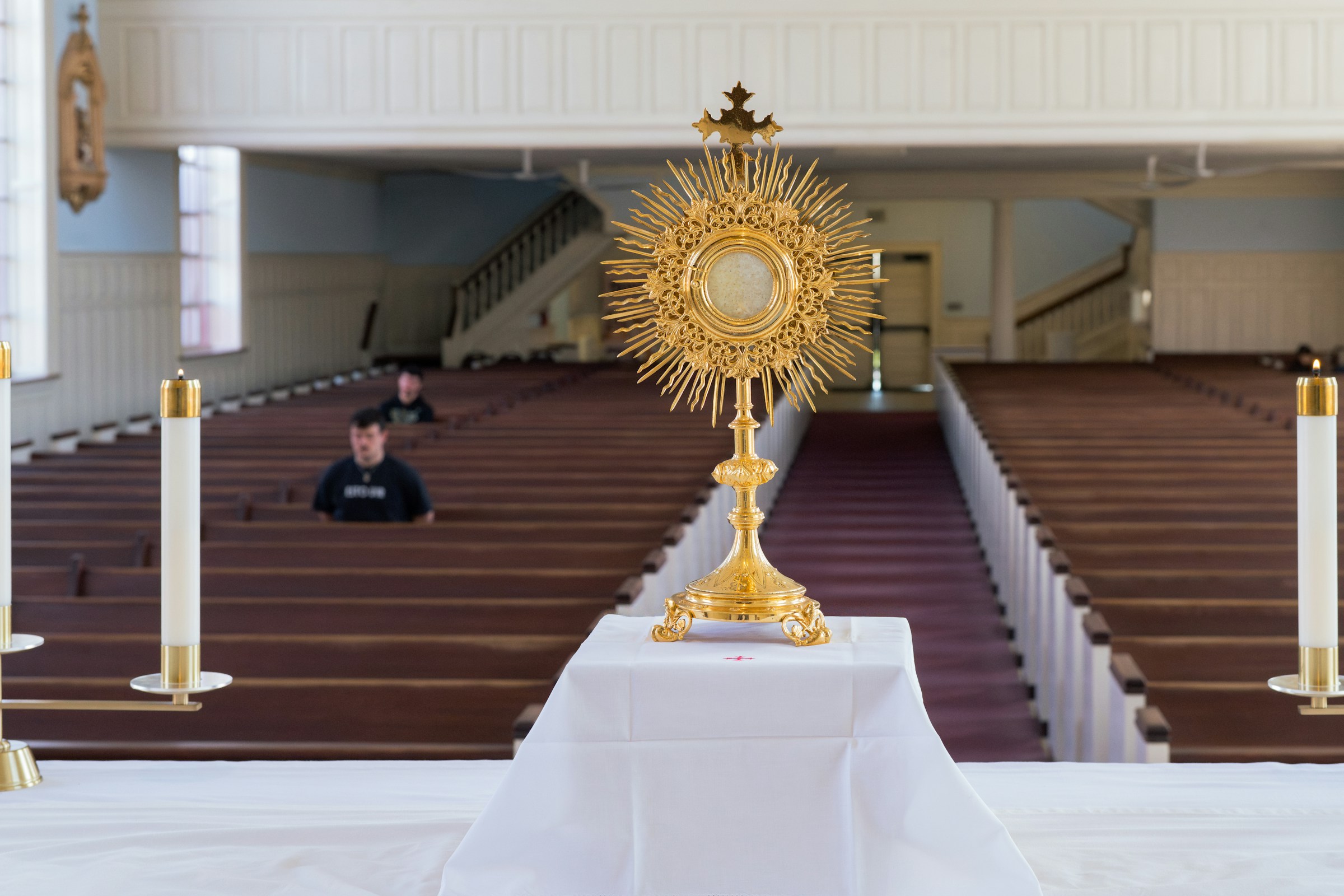 A gold monstrance during Eucharistic Adoration at St. Mary’s Catholic Center Historic Church.